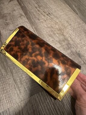 Tory Burch Tortoise-Pattern Clutch with Gold Trim
